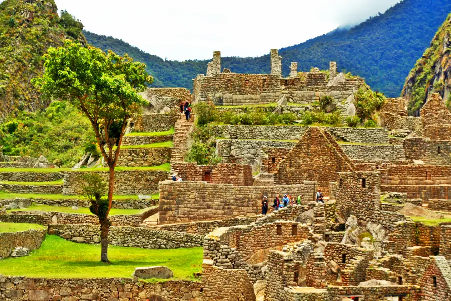 Wide panoramic shot of Machu Picchu ruins with Huayna Picchu in the background | Conde Travel Adventures
