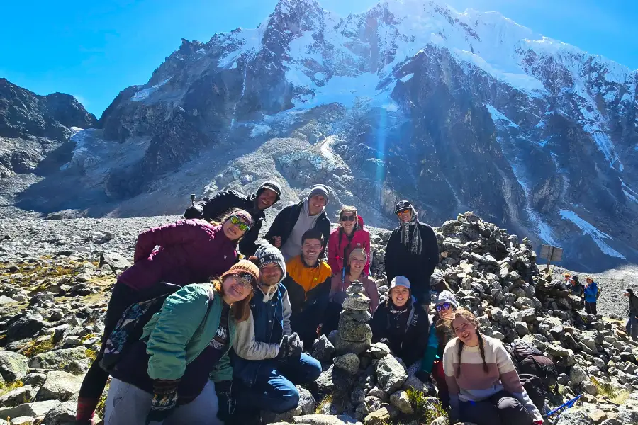 Group of travelers hiking the Salkantay mountain in Peru during a trekking adventure | Conde Travel Adventures