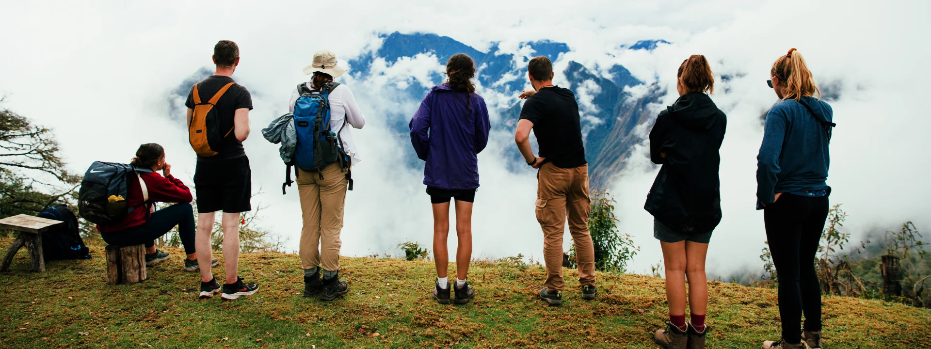 Group of tourists enjoying breathtaking scenery in the Andes mountains of Peru | Conde Travel Adventures
