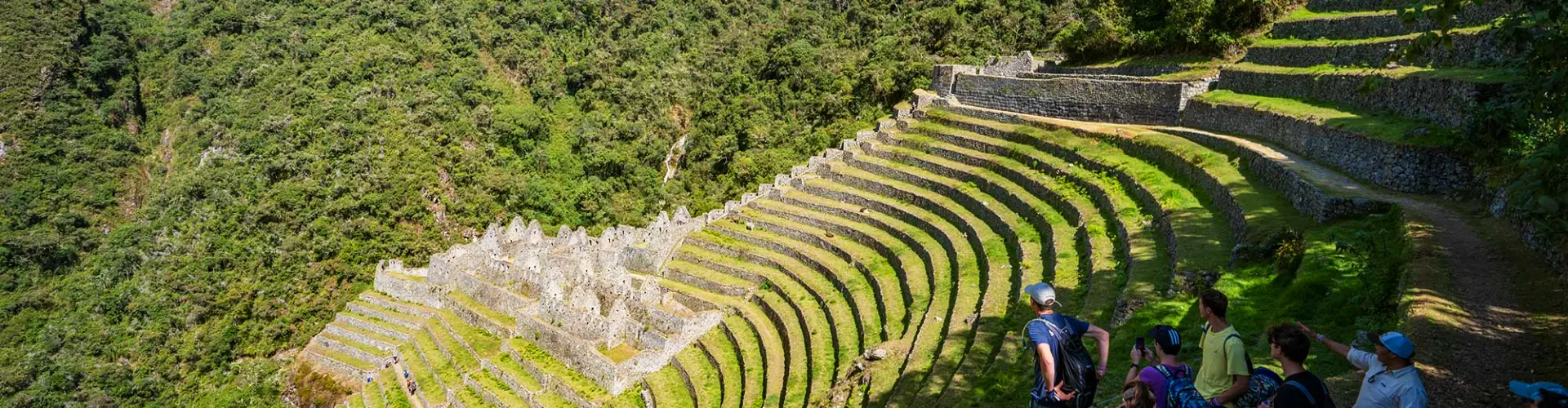 Stone terraces and structures of Wiñay Wayna, an archaeological site on the Inca Trail to Machu Picchu | Conde Travel Adventures