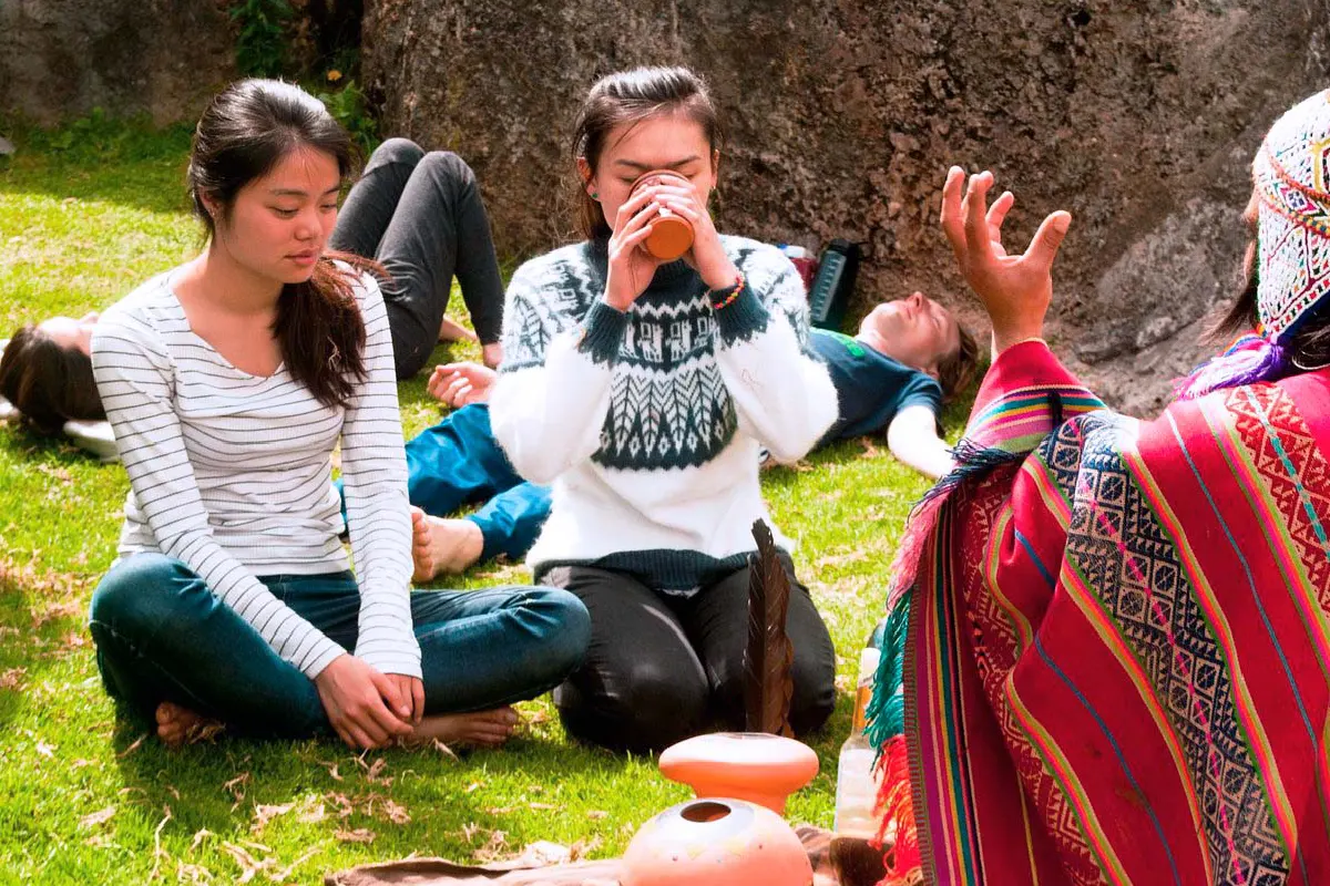 Travelers in an ayahuasca ceremony guided by a shaman in Peru | Conde Travel Adventures
