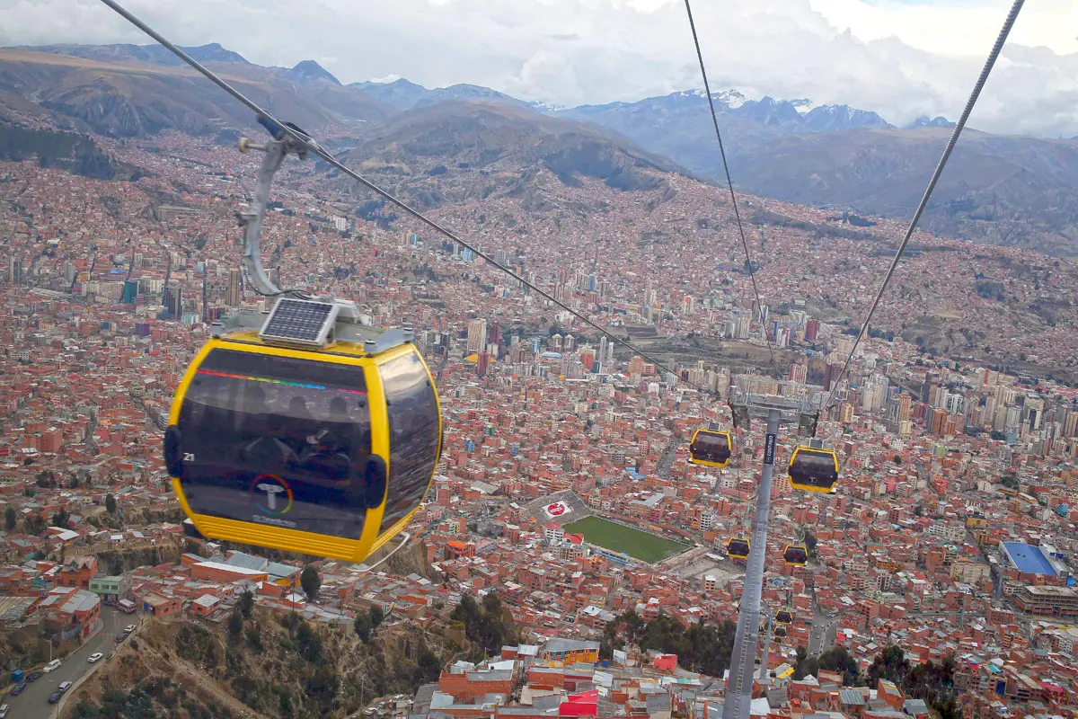Aerial view of La Paz, Bolivia from a yellow Mi Teleférico cable car | Conde Travel Adventures