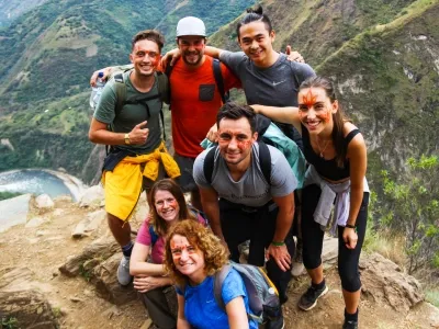 Group of young travelers on the Inca Jungle Trail in the Andes of Peru