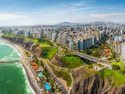 Aerial view of Lima’s Costa Verde and Malecón with cliffs and the Pacific Ocean | Conde Travel Adventures